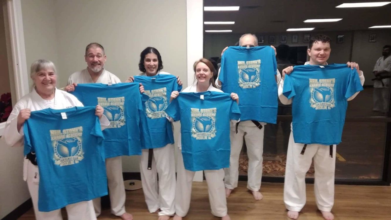 Neil Stone Karate Students getting 100 class Tshirts